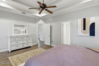 Beautiful home located in a desirable golf course community and on Bay Pointe Golf and Resort in Mississippi - for sale on GolfHomes.com, golf home, golf lot