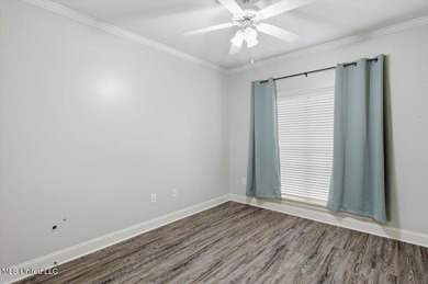 Beautiful home located in a desirable golf course community and on Bay Pointe Golf and Resort in Mississippi - for sale on GolfHomes.com, golf home, golf lot