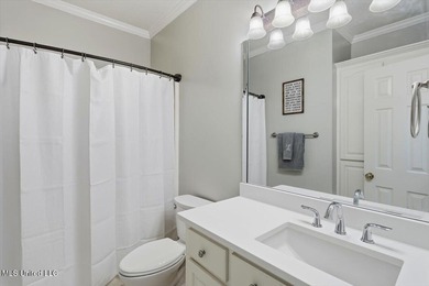 Beautiful home located in a desirable golf course community and on Bay Pointe Golf and Resort in Mississippi - for sale on GolfHomes.com, golf home, golf lot