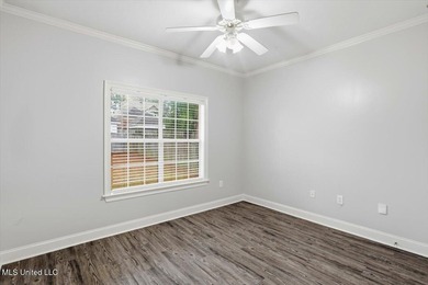 Beautiful home located in a desirable golf course community and on Bay Pointe Golf and Resort in Mississippi - for sale on GolfHomes.com, golf home, golf lot