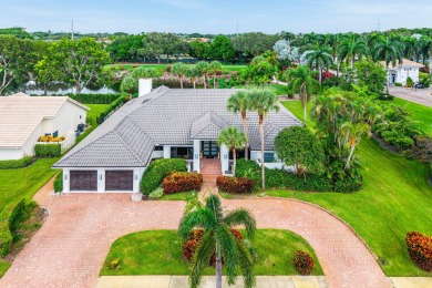 Sunny & warm tropical paradise! This beautifully updated & on Bocaire Country Club in Florida - for sale on GolfHomes.com, golf home, golf lot