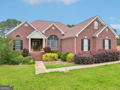 Welcome home to this beautiful all-brick ranch in the on Canongate At Georgia National Golf Club in Georgia - for sale on GolfHomes.com, golf home, golf lot