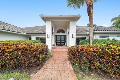 Sunny & warm tropical paradise! This beautifully updated & on Bocaire Country Club in Florida - for sale on GolfHomes.com, golf home, golf lot