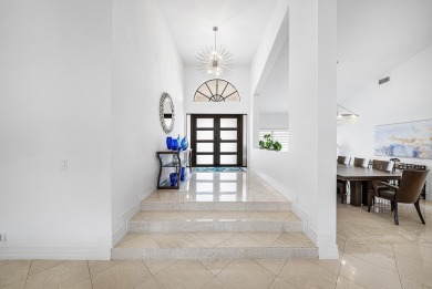 Sunny & warm tropical paradise! This beautifully updated & on Bocaire Country Club in Florida - for sale on GolfHomes.com, golf home, golf lot