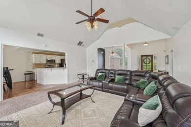 Welcome home to this beautiful all-brick ranch in the on Canongate At Georgia National Golf Club in Georgia - for sale on GolfHomes.com, golf home, golf lot