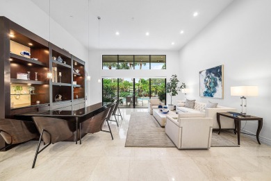Sunny & warm tropical paradise! This beautifully updated & on Bocaire Country Club in Florida - for sale on GolfHomes.com, golf home, golf lot