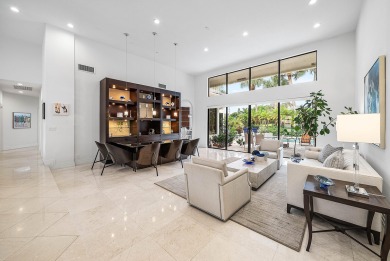 Sunny & warm tropical paradise! This beautifully updated & on Bocaire Country Club in Florida - for sale on GolfHomes.com, golf home, golf lot