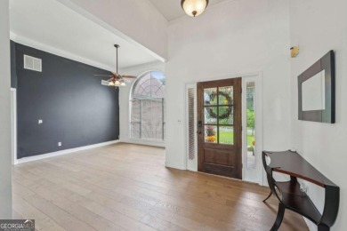 Welcome home to this beautiful all-brick ranch in the on Canongate At Georgia National Golf Club in Georgia - for sale on GolfHomes.com, golf home, golf lot