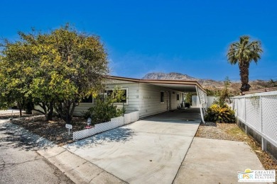 2bed/2bath 1440 sq ft home nestled on an oversized lot with on Date Palm Country Club in California - for sale on GolfHomes.com, golf home, golf lot