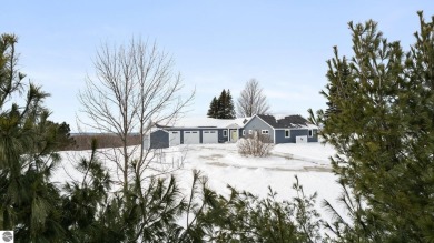 Welcome to *Built for a Lifetime,* a home designed with enduring on Antrim Dells Golf Course in Michigan - for sale on GolfHomes.com, golf home, golf lot