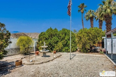 2bed/2bath 1440 sq ft home nestled on an oversized lot with on Date Palm Country Club in California - for sale on GolfHomes.com, golf home, golf lot