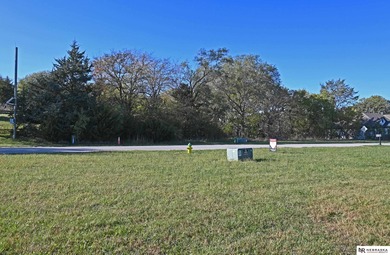 Jill Bobenhouse Tesar, M: , jilltbob,   - This level parcel is on Bay Hills Golf Club in Nebraska - for sale on GolfHomes.com, golf home, golf lot