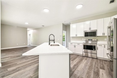 Completely renovated 4-bedroom 3-bathroom home located in on Heritage Harbor Golf and Country Club in Florida - for sale on GolfHomes.com, golf home, golf lot