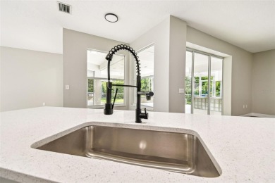 Completely renovated 4-bedroom 3-bathroom home located in on Heritage Harbor Golf and Country Club in Florida - for sale on GolfHomes.com, golf home, golf lot