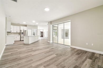 Completely renovated 4-bedroom 3-bathroom home located in on Heritage Harbor Golf and Country Club in Florida - for sale on GolfHomes.com, golf home, golf lot