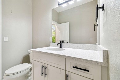 Completely renovated 4-bedroom 3-bathroom home located in on Heritage Harbor Golf and Country Club in Florida - for sale on GolfHomes.com, golf home, golf lot