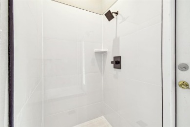 Completely renovated 4-bedroom 3-bathroom home located in on Heritage Harbor Golf and Country Club in Florida - for sale on GolfHomes.com, golf home, golf lot
