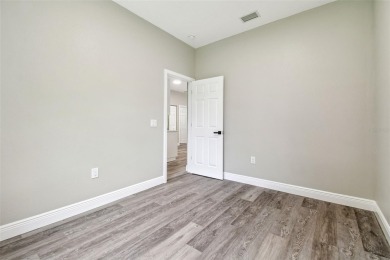 Completely renovated 4-bedroom 3-bathroom home located in on Heritage Harbor Golf and Country Club in Florida - for sale on GolfHomes.com, golf home, golf lot