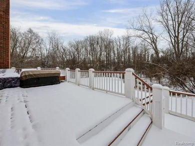 This stunning brick colonial masterpiece sits on a large on Farmington Hills Golf Club in Michigan - for sale on GolfHomes.com, golf home, golf lot