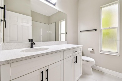 Completely renovated 4-bedroom 3-bathroom home located in on Heritage Harbor Golf and Country Club in Florida - for sale on GolfHomes.com, golf home, golf lot