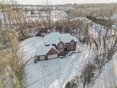 This stunning brick colonial masterpiece sits on a large on Farmington Hills Golf Club in Michigan - for sale on GolfHomes.com, golf home, golf lot