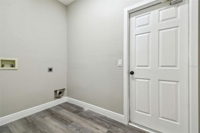 Completely renovated 4-bedroom 3-bathroom home located in on Heritage Harbor Golf and Country Club in Florida - for sale on GolfHomes.com, golf home, golf lot