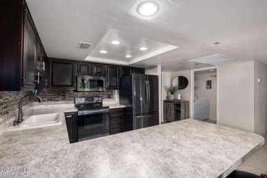 This luxurious 2-bedroom, 2-bathroom condo offers the perfect on Scottsdale Shadows in Arizona - for sale on GolfHomes.com, golf home, golf lot