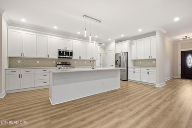 Move-in ready and thoughtfully upgraded, this 3-bedroom, 2-bath on Toqua Golf Course - Loudon County in Tennessee - for sale on GolfHomes.com, golf home, golf lot