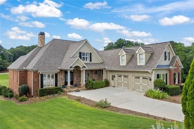 Situated within the sought-after Traditions of Braselton, this on Traditions of Braselton Golf Club in Georgia - for sale on GolfHomes.com, golf home, golf lot