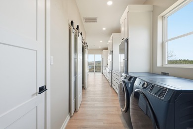 Incredible 2023 Construction with Lake Catherine Views in on Diamondhead Golf and Country Club in Arkansas - for sale on GolfHomes.com, golf home, golf lot