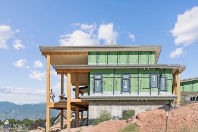 Tucked into the rugged beauty of Utah's high country, where red on Red Ledges Golf Club in Utah - for sale on GolfHomes.com, golf home, golf lot