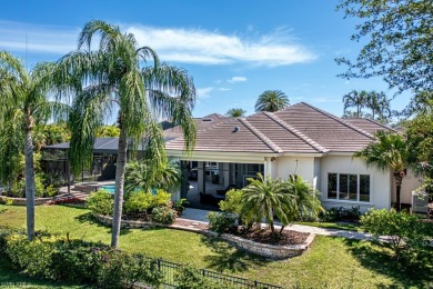 Stunning single story estate home caters to large families and on Quail West Golf and Country Club in Florida - for sale on GolfHomes.com, golf home, golf lot