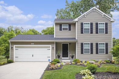 Welcome to this spacious 4-bedroom, 2.5-bath set on nearly half on Lake Doster Golf Club in Michigan - for sale on GolfHomes.com, golf home, golf lot