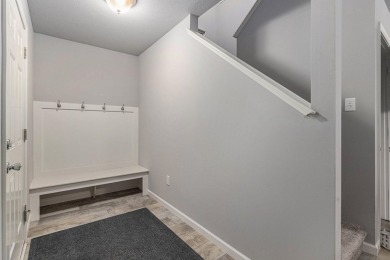 Welcome to this spacious 4-bedroom, 2.5-bath set on nearly half on Lake Doster Golf Club in Michigan - for sale on GolfHomes.com, golf home, golf lot