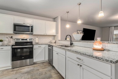 Welcome to this spacious 4-bedroom, 2.5-bath set on nearly half on Lake Doster Golf Club in Michigan - for sale on GolfHomes.com, golf home, golf lot