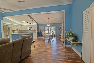 This beautifully updated and expanded Holly model offers 3 on The Links of Spruce Creek in Florida - for sale on GolfHomes.com, golf home, golf lot