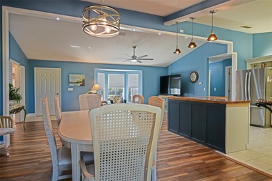 This beautifully updated and expanded Holly model offers 3 on The Links of Spruce Creek in Florida - for sale on GolfHomes.com, golf home, golf lot