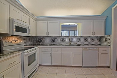 This beautifully updated and expanded Holly model offers 3 on The Links of Spruce Creek in Florida - for sale on GolfHomes.com, golf home, golf lot