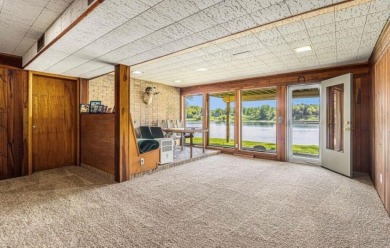 Beautiful lakefront home on 2nd Lake in Fremont, Michigan, with on Ramshorn on the Lakes in Michigan - for sale on GolfHomes.com, golf home, golf lot