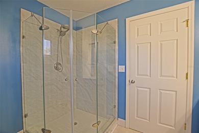 This beautifully updated and expanded Holly model offers 3 on The Links of Spruce Creek in Florida - for sale on GolfHomes.com, golf home, golf lot