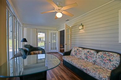 This beautifully updated and expanded Holly model offers 3 on The Links of Spruce Creek in Florida - for sale on GolfHomes.com, golf home, golf lot