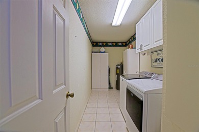 This beautifully updated and expanded Holly model offers 3 on The Links of Spruce Creek in Florida - for sale on GolfHomes.com, golf home, golf lot