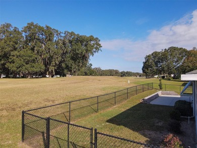 This beautifully updated and expanded Holly model offers 3 on The Links of Spruce Creek in Florida - for sale on GolfHomes.com, golf home, golf lot