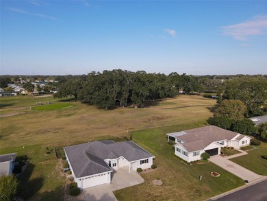 This beautifully updated and expanded Holly model offers 3 on The Links of Spruce Creek in Florida - for sale on GolfHomes.com, golf home, golf lot
