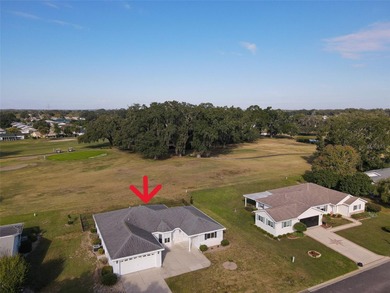 This beautifully updated and expanded Holly model offers 3 on The Links of Spruce Creek in Florida - for sale on GolfHomes.com, golf home, golf lot