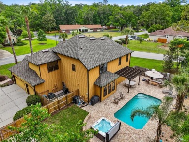 Welcome to one of the nicest pool homes in the gated golf course on Turkey Creek Golf and Country Club in Florida - for sale on GolfHomes.com, golf home, golf lot