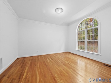 Welcome home to this beautiful 4-bedroom, 2.5-bath transitional on Highlands Golfers Club in Virginia - for sale on GolfHomes.com, golf home, golf lot