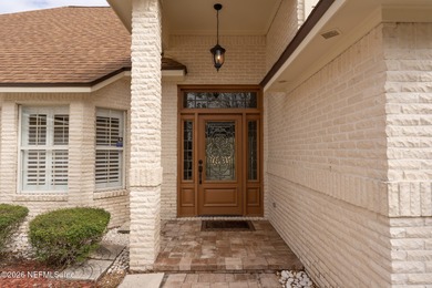 Beautifully maintained one story, 3 bedroom,2 bathroom home on Jacksonville Golf and Country Club in Florida - for sale on GolfHomes.com, golf home, golf lot