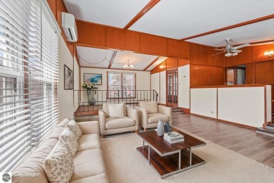 Located just within the city limits, this home offers character on Traverse City Golf and Country Club in Michigan - for sale on GolfHomes.com, golf home, golf lot
