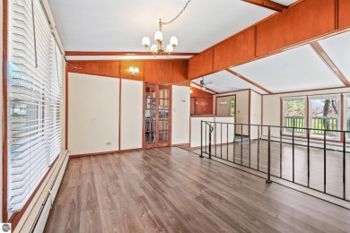 Located just within the city limits, this home offers character on Traverse City Golf and Country Club in Michigan - for sale on GolfHomes.com, golf home, golf lot